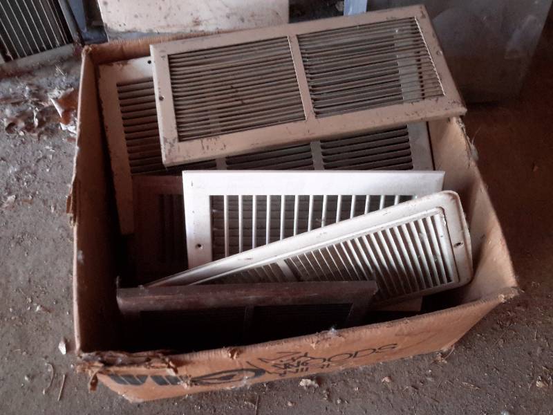 lot 46 image: 2 upright Air Returns and lot of older furnace registervents