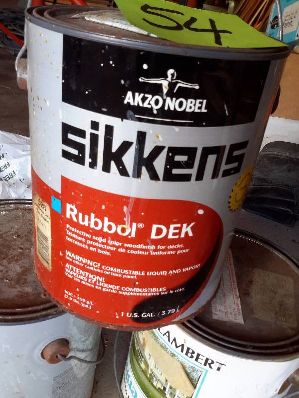 lot 54 image: 2 unopened gallons of SIKKEN, Deck Stain. 1 Gallon unopened, Aqua Royal Paint Base (color to be added).