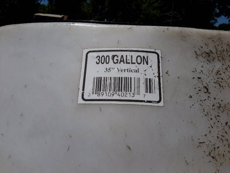 lot 26 image: Heavy Plastic Tank.. Appox 30 in x 72in h.