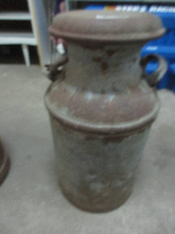 lot 39 image: vintage metal milk jug