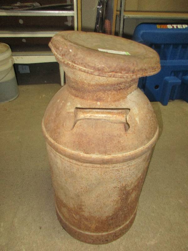 lot 40 image: vintage metal milk jug