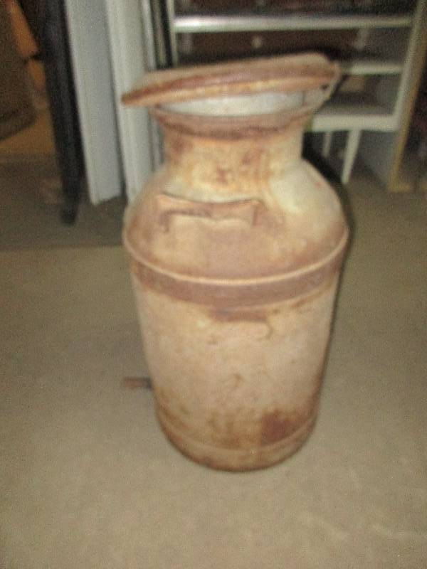 lot 41 image: vintage metal milk jug