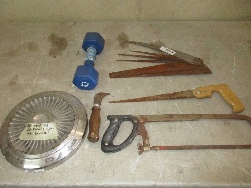 lot 77 image: saws and saw blades - 1963 ford hub cap