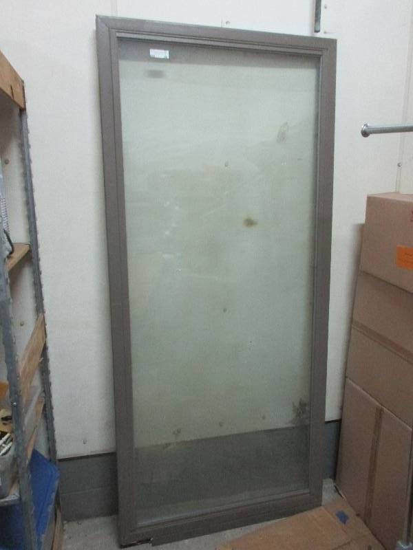 lot 89 image: Anderson glass door - needs new track 36.5 x 80.5