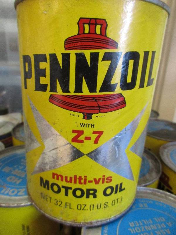 lot 33-2 image: 12 quarts Pennzoil 10-30 oil and 6 cans STP all unopened 1 dot 3 break fluid 1 can grease 1 can chain saw oil
