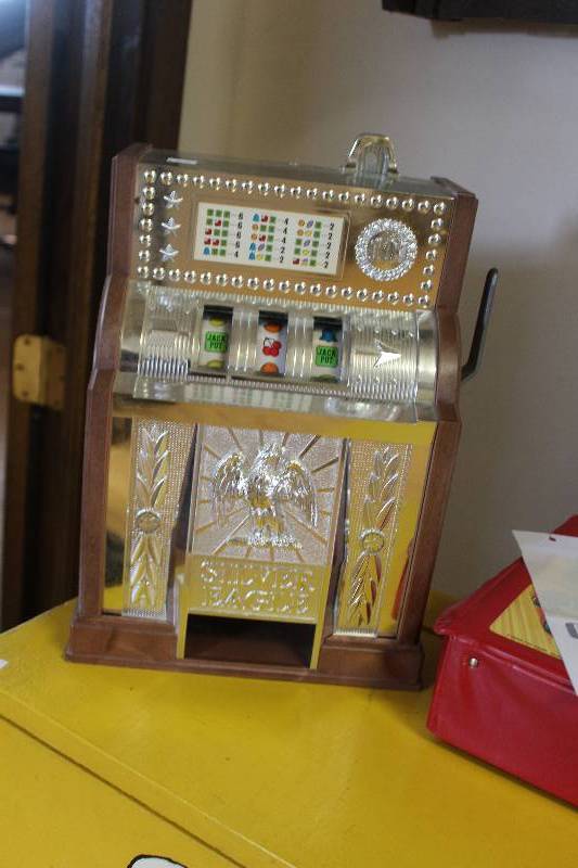 lot 102 image: Silver Eagle Slot Machine