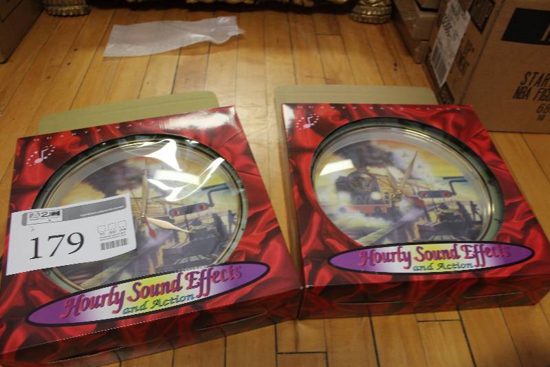 lot 179 image: Lot of (2) Hourly Sound Effects Train Clocks