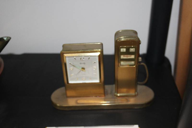 lot 491 image: Gold Gas Pump ClockCalendar