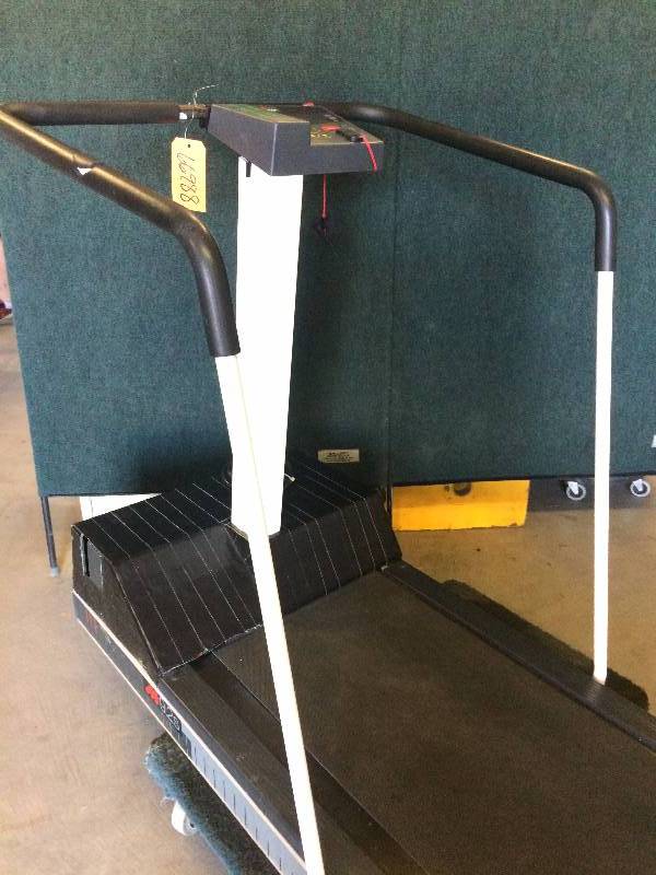 lot 110 image: Wow Retails Used $1200 Precor EFX 546 Elliptical Heart Rate Exercise Machine - Update Works Great - Front Base Has Been Taped Up - See Pics