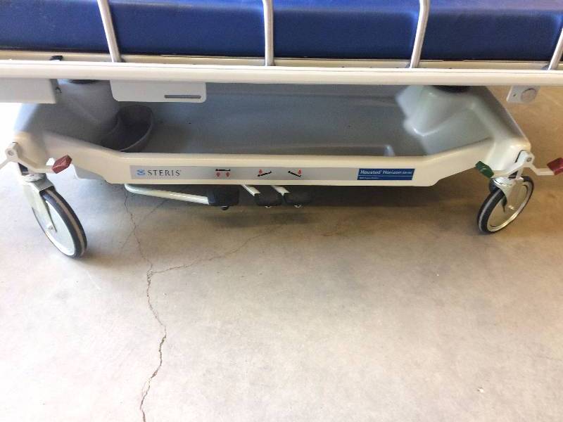 lot 8 image: Retail Used $3000 Hausted Horizon Hydraulic 500 lb Weight Capacity Multipurpose Surgical Stretcher EMT Gurney Hospital Transport Bed Free Used Mattress - Great For Mechanics Too - Super Condition