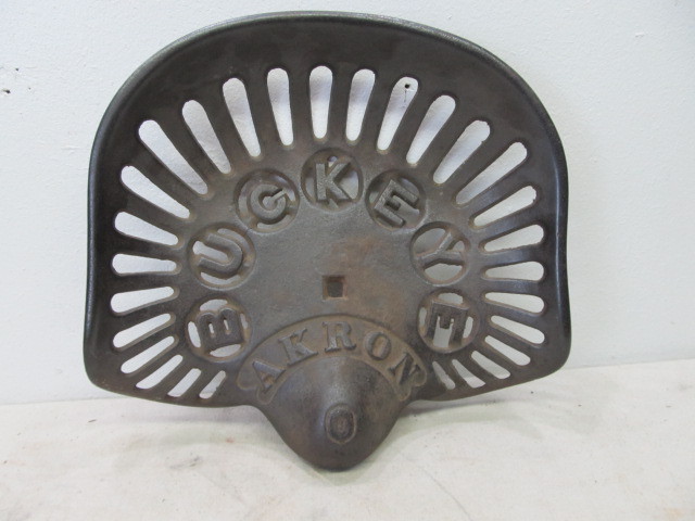 lot 1 image: Antique Cast Iron BUCKEYE Tractor Seat