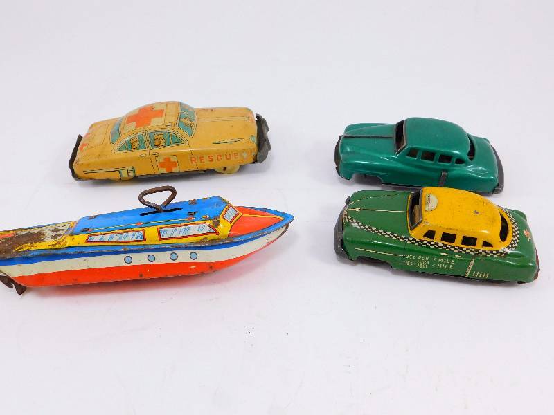 lot 55 image: Lot of Vintage Tin Litho Vehicles