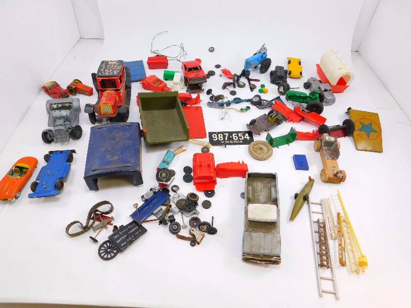 lot 63 image: Large lot of vintage toy parts and brokenmismatched pieces
