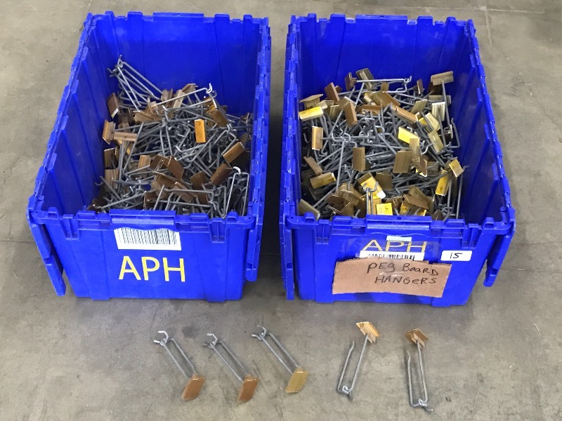 lot 15 image: (2) Totes Of Assorted Peg-Board Hoo...