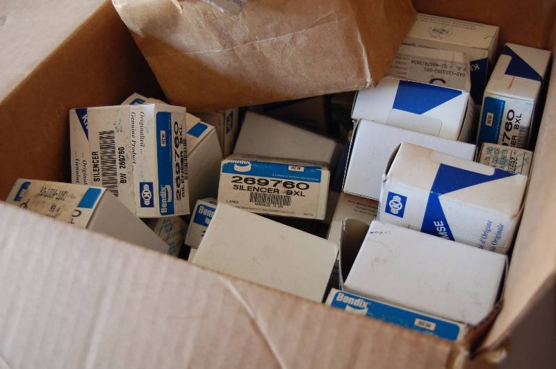 lot 36 image: Large Box of Bus Brake Silencers