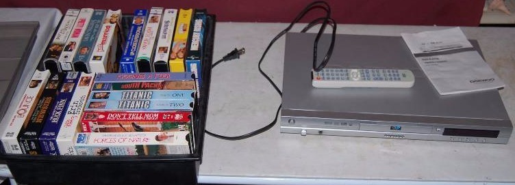 lot 165 image: DVD Player and VHS Tapes
