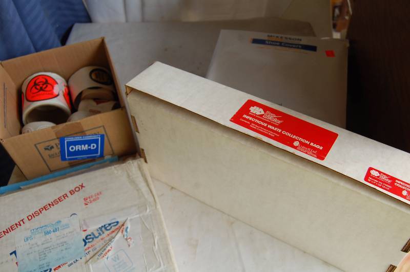 lot 200 image: Shoe Covers, Infectious Waste Collection Bags, and More