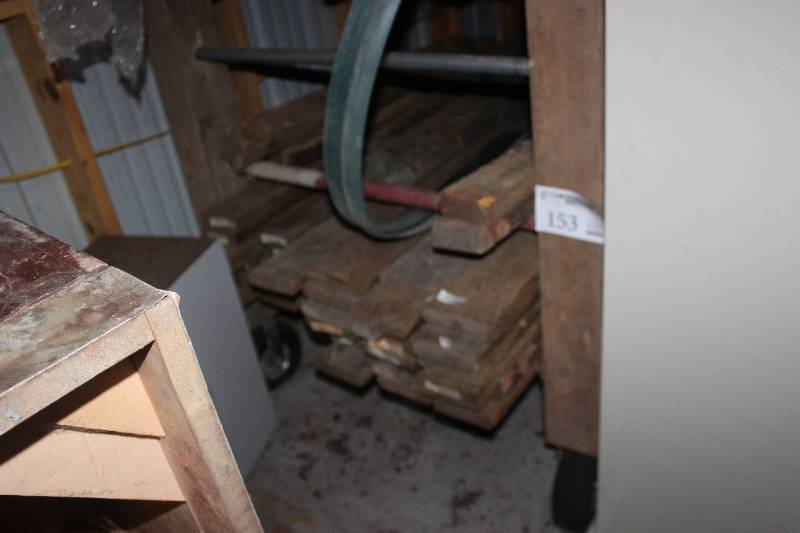 lot 153 image: Lot of Approx. (250) 5 14 x 6 Foot Treated Lumber and 4-Wheel Holding Rack