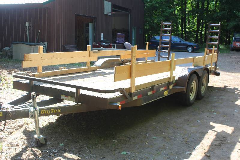 lot 5 image: 2005 BIG Tex 12ET 4-Wheel 2-Axle Wood Flat Bed Trailer w 2 Fold-up Ramps
