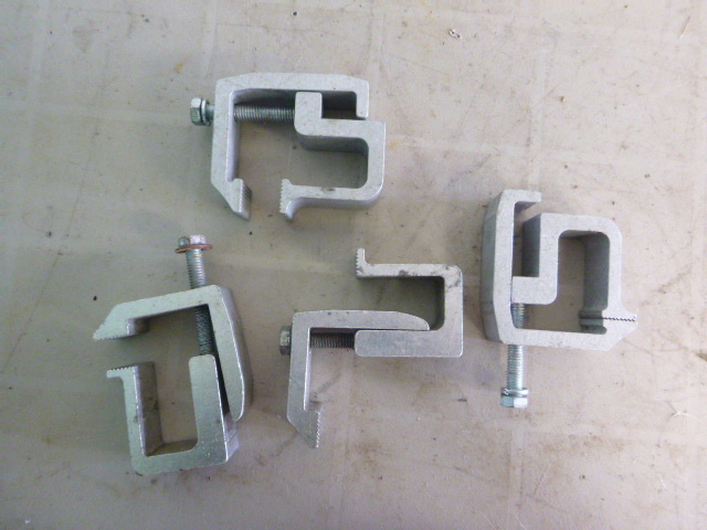 lot 75 image: 4 Topper Clamps