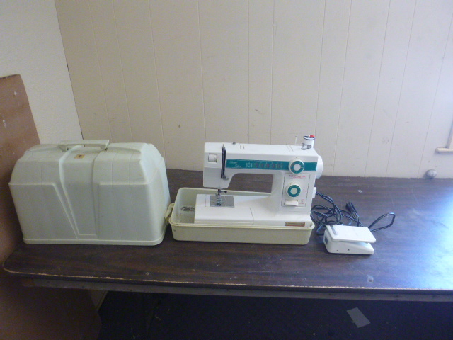 lot 103 image: Janome New Home Sewing Machine