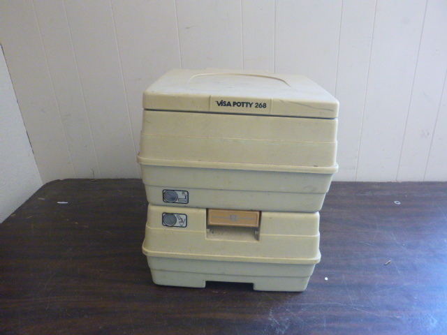 lot 104 image: Visa Potty Portable Toilet