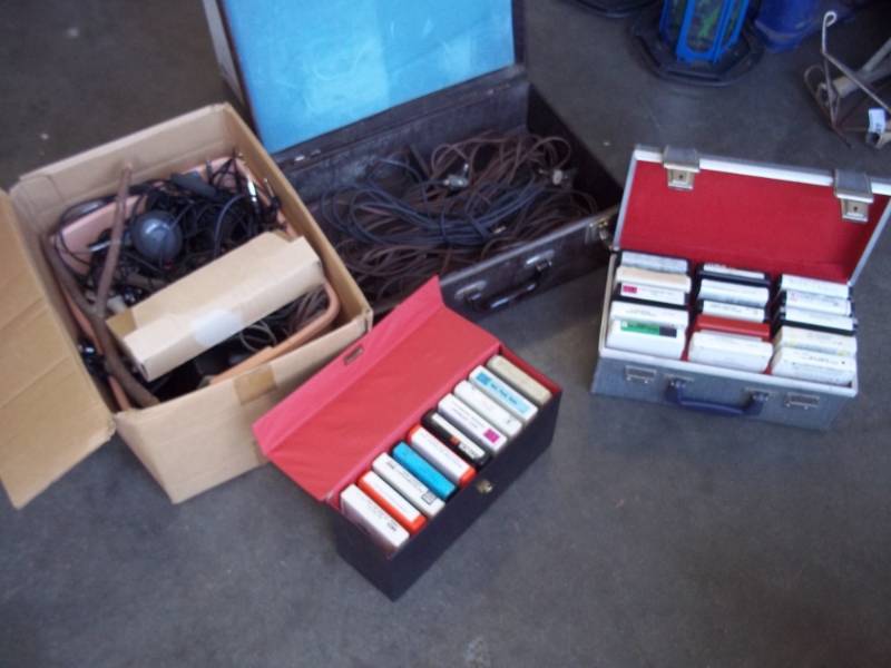 lot 37 image: 8 Track tapes, tape cases, and misc electronics