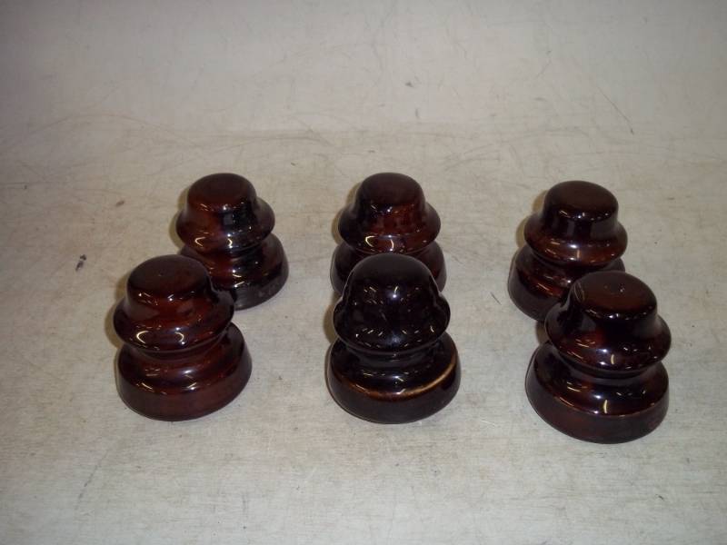 lot 8 image: 6 smaller brown insulators