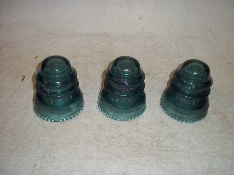 lot 11 image: 3 large green insulators -- all are Himingray - 42.