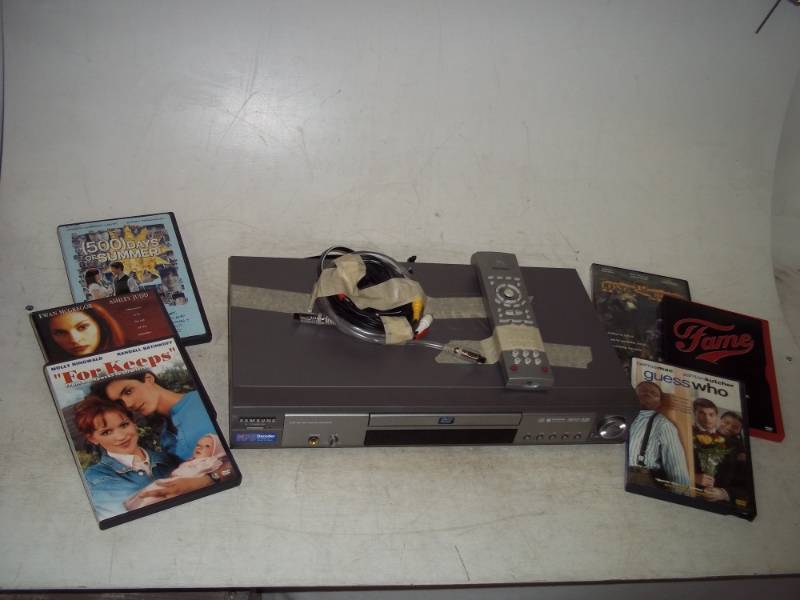 lot 80 image: DVD Player with Remote and DVDs