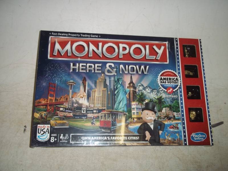 lot 84 image: Sealed Monopoly Game Hear and now