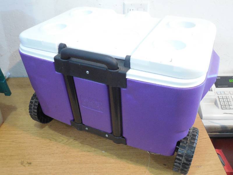 lot 13 image: Coleman Mn Vikings Cooler on Wheels with handle