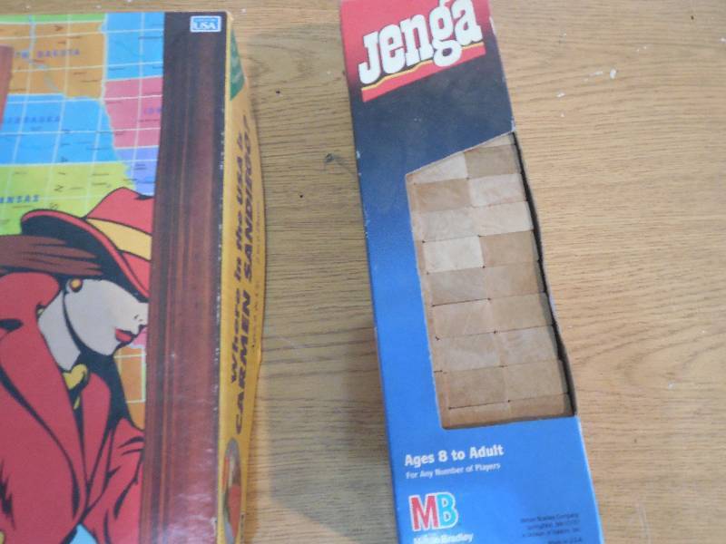 lot 39 image: Jenga game and Where in the World Is Carmen San Diego game