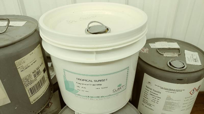 lot 225 image: 8.05lbs of Tropical Sunset Fragrance Oil