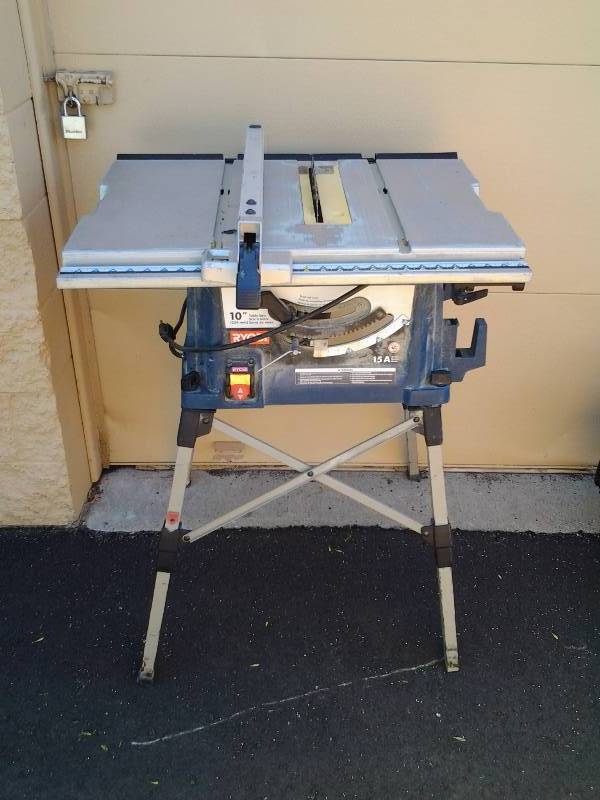 lot 2 image: Ryobi 10 Inch 15 Amp Table Saw With Collapsible Stand