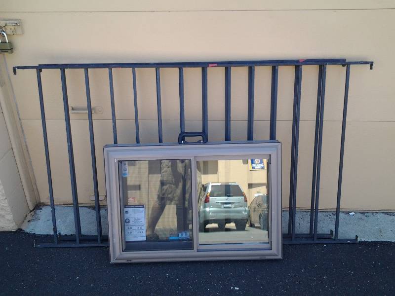 lot 4 image: 2 Piece Wrought Iron Railing 55-12x35 & 64x35 & 32x22 & Sliding Window Salesman Sample Vinyl Double Slider
