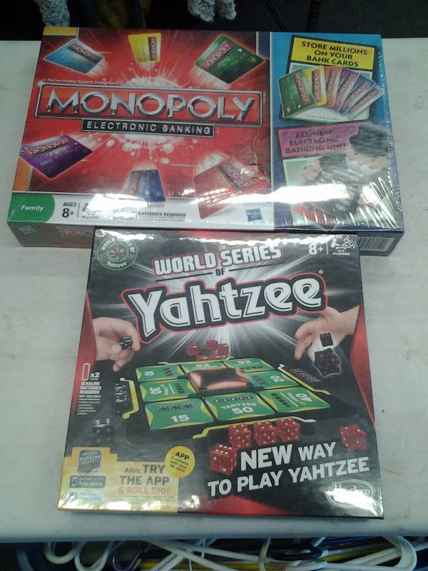 lot 32 image: New Electric Banking Monopoly Game & World Series Yahtzee Game