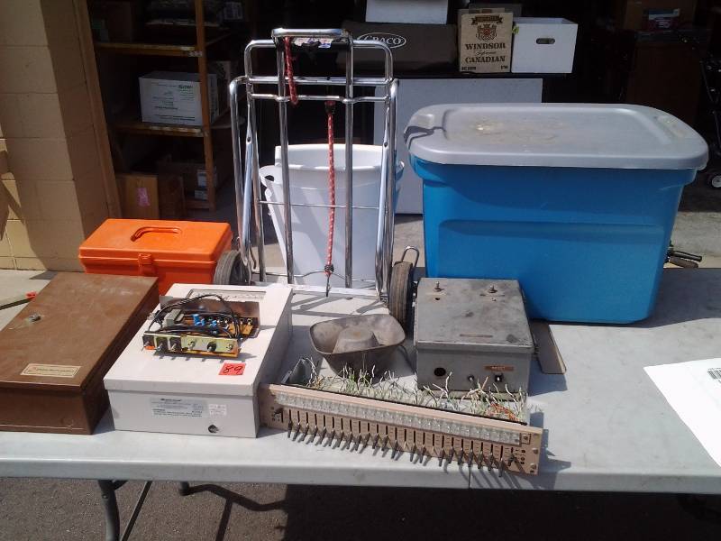 lot 89 image: Folding Luggage Cart, Tote With Assorted Electrical Panels, Tote Box, Waste Baskets