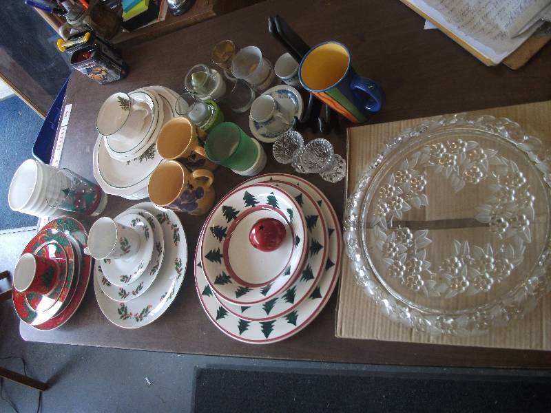 lot 102 image: Glass Cake Plate, Seasonal Dishes, Cups, Saucers (Christmas), Tooth Pick Holder, Candle Holders