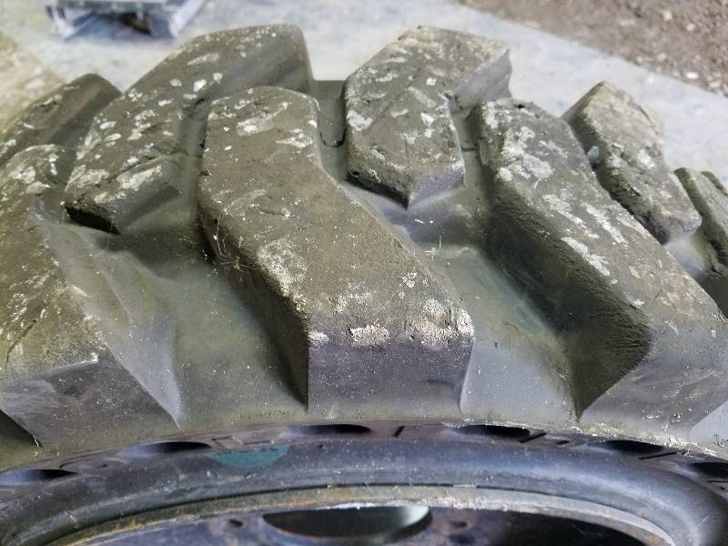 lot 48 image: Airless Bobcat Tire...10-20