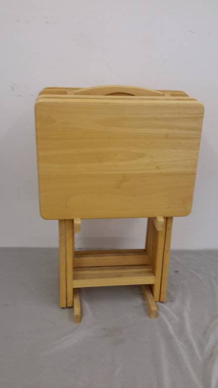 4 folding TV trays on stand