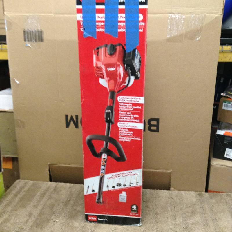 lot 45 image: Toro 2-Cycle 25.4cc Power Head for Trimmers Model#  51948 open box never used