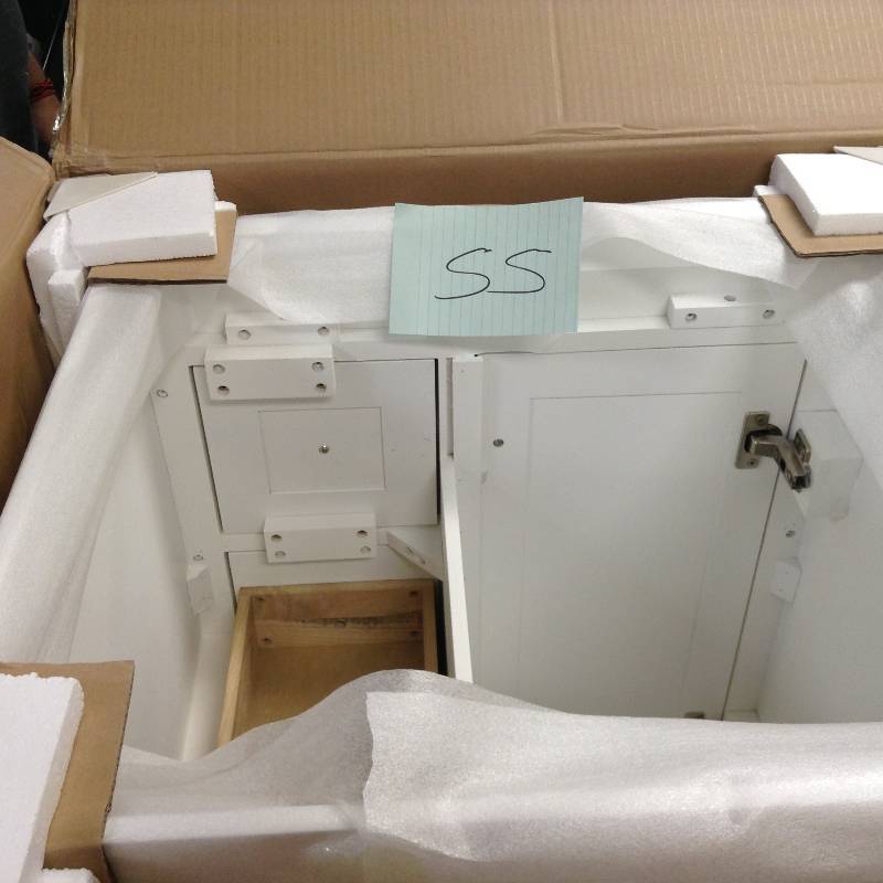 lot 55 image: Foremost Naples 24 in. W x 21-78 in. D x 34 in. H Vanity Cabinet Only in White open box never used