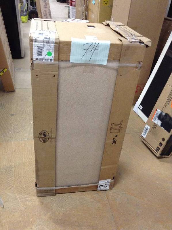 lot 74 image: Hampton Bay Hampton Assembled 30x12x12 in. Wall Bridge Kitchen Cabinet in Satin White New