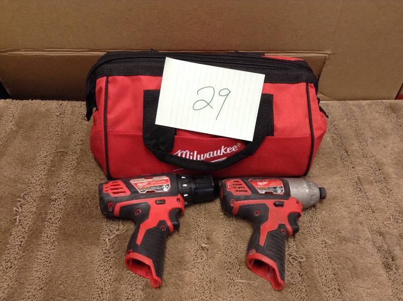 lot 29 image: Milwaukee 2494-82 M12 12V Cordless Lithium-Ion 38 in. Drill Driver and Impact Driver set Tools Only