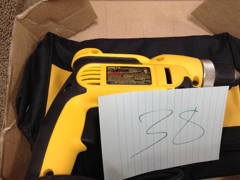 lot 38 image: DEWALT 38 in. Pistol Grip Drill Kit in like New working conditions