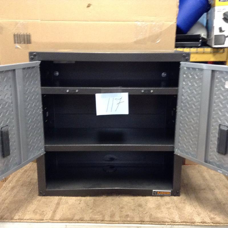 lot 117 image: Gladiator Ready to Assemble 28 in. H x 28 in. W x 12 in. D Steel 2-Door Garage Wall Cabinet with Shelf in Silver Tread open box never used whit small damage