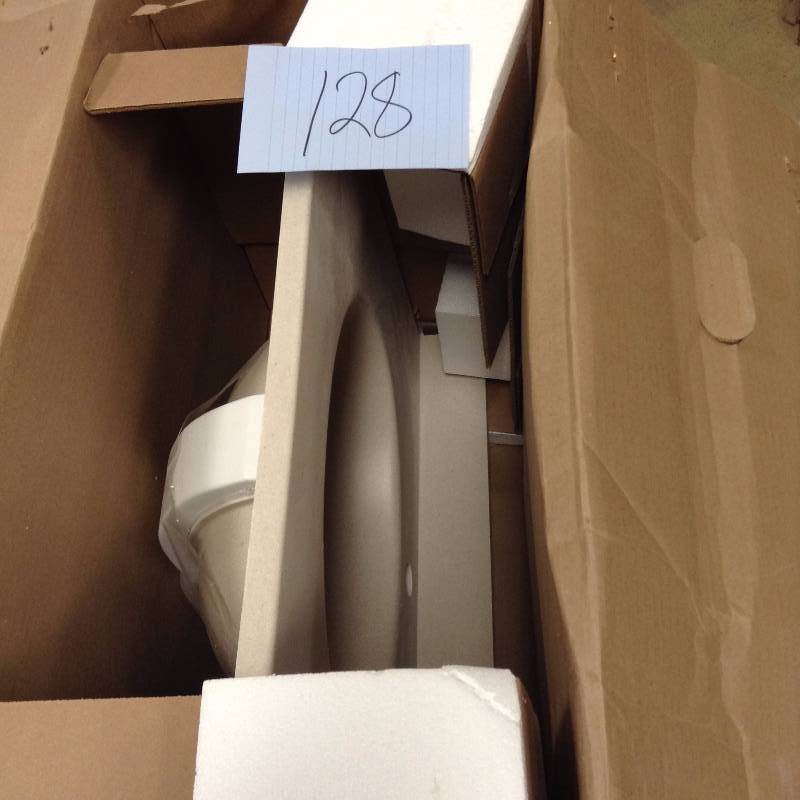 lot 128 image: Swan Ellipse 25 in. W x 19 in. D x 10-14 in. H Solid-Surface Vanity Top in Tahiti Sand with Tahiti Sand Basin Model # VT1B1925-051 open box never used