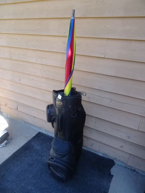 lot 31 image: Arnold Palmer Golf Bag, Umbrella.
