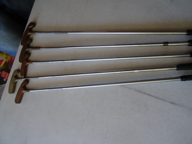 lot 98 image: Acushnet Brass Putters.